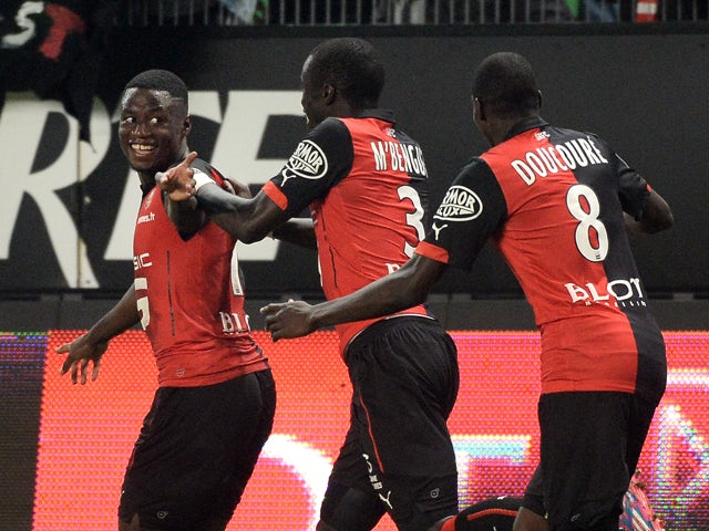 Rennes' French Cameroonian forward Paul-Georges Ntep celebrates with teammates after scoring a goal during the French L1 football match between Rennes and Lens at the Route de Lorient stadium in Rennes, western France, on October 4, 2014