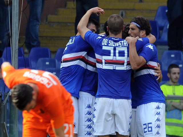 Manolo Gabbiadini of UC Sampdoria celebrates the goal of 1-0 with his team player during the Serie A match against Atalanta on October 5, 2014