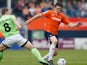 Matt Robinson of Luton Town avoids the challenge of Yan Klukowski of Forest Green during the Skrill Conference Premier match between Luton Town and Forest Green at Kenilworth Road on April 21, 2014