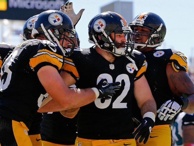 Michael Palmer #82 of the Pittsburgh Steelers celebrates with teammates after scoring a touchdown during the second quarter of the game against the Jacksonville Jaguars on October 5, 2014