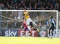 Ryan Cresswell of Northampton Town rises to head his sides 1st goal during the Sky Bet League Two match between Wycombe Wanderers and Northampton Town at Adams Park on October 4, 2014