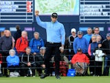 Oliver Wilson of England reacts after holing a birdie putt on thre 18th green during the first round of the 2014 Alfred Dunhill Links Championship at the Championship Links at Carnoustie on October 2, 2014