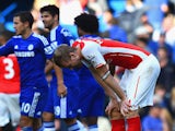 A dejected Per Mertesacker of Arsenal after defeat during the Barclays Premier League match between Chelsea and Arsenal at Stamford Bridge on October 4, 2014