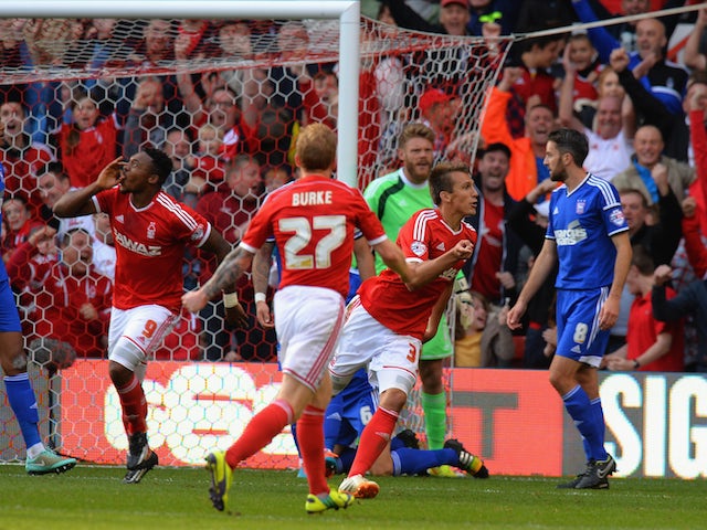 Robert Tesche of Nottingham Forest celebrates scoring their first goal during the Sky Bet Championship match between Nottingham Forest and Ipswich Town on October 5, 2014