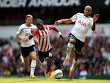 Sadio Mane of Southampton battles for the ball with Younes Kaboul of Spurs during the Barclays Premier League match on October 5, 2014