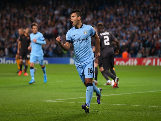 Sergio Aguero of Manchester City celebrates scoring the opening goal from a penalty kick during the UEFA Champions League Group E match against Roma on September 30, 2014