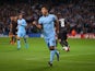 Sergio Aguero of Manchester City celebrates scoring the opening goal from a penalty kick during the UEFA Champions League Group E match against Roma on September 30, 2014