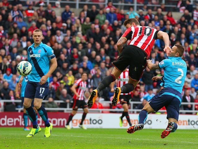 Connor Wickham of Sunderland heads the ball to score the opening goal during the Barclays Premier League match between Sunderland and Stoke City at Stadium of Light on October 4, 2014