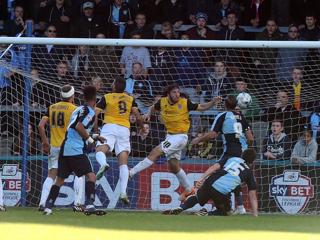Aaron Holloway of Wycombe Wanderers scores his sides goal during the Sky Bet League Two match between Wycombe Wanderers and Northampton Town at Adams Park on October 4, 2014