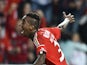 Benfica's Brazilian forward Anderson Talisca celebrates after scoring during the Portuguese Liga football match Benfica vs Arouca at Luz stadium in Lisbon on October 5, 2014