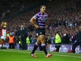 Ben Flower of Wigan walks from the pitch after receiving a red card during the First Utility Super League Grand Final match between St Helens and Wigan Warriors at Old Trafford on October 11, 2014