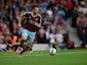 Carl Jenkinson of West Ham United in action during the Barclays Premier League match between West Ham United and Queens Park Rangers at Boleyn Ground on October 5, 2014
