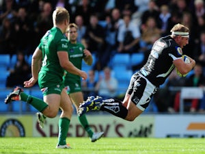Carl Rimmer of Exeter Chiefs dives over for his side's opening try during the Aviva Premiership match between Exeter Chiefs and London Irish at Sandy Park on October 11, 2014