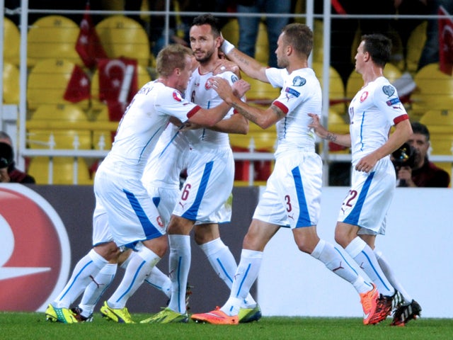 Czech Republic's Tomas Sivok celebrates with teammmates after scoring against Turkey during the UEFA Euro 2016 Group A qualifying football match Turkey vs Czech Republic on October 10, 2014