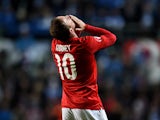 Wayne Rooney of England celebrates after scoring the opening goal from a free kick during the EURO 2016 Qualifier match between Estonia and England at A. Le Coq Arena on October 12, 2014