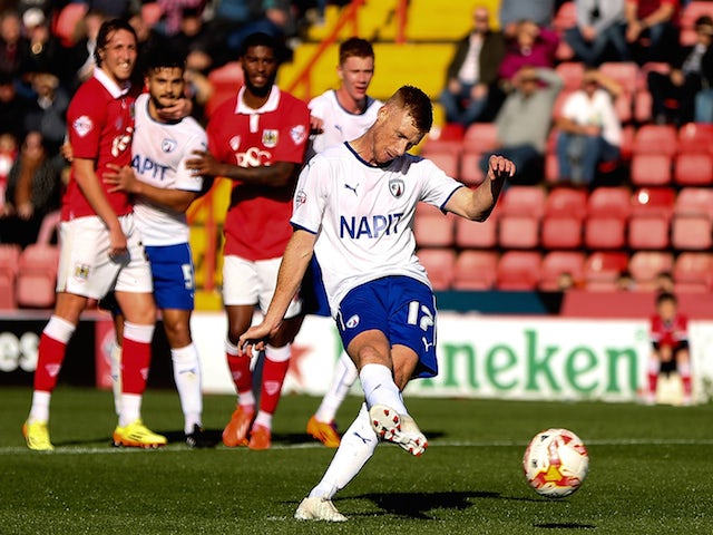 Eoin Doyle of Chesterfield scores his team's first goal of the game during the Sky Bet League One match against Bristol City on October 11, 2014