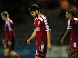 George Barker of Swindon Town looks dejected during the Johnstone's Paint Trophy second round match between Plymouth Argyle and Swindon Town at Home Park on October 7, 2014