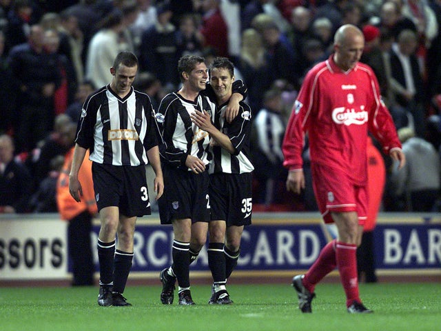 Phil Jevons of Grimsby celebrates with Michael Boulding and Tony Gallimore after beating Liverpool 2-1 during the Liverpool v Grimsby Town Worthington Cup Third Round match at Anfield on 9 October, 2001