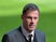 Carragher plays down Liverpool title hopes