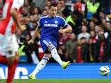 Chelsea's English defender John Terry passes the ball during the English Premier League football match between Chelsea and Arsenal at Stamford Bridge in London on October 5, 2014