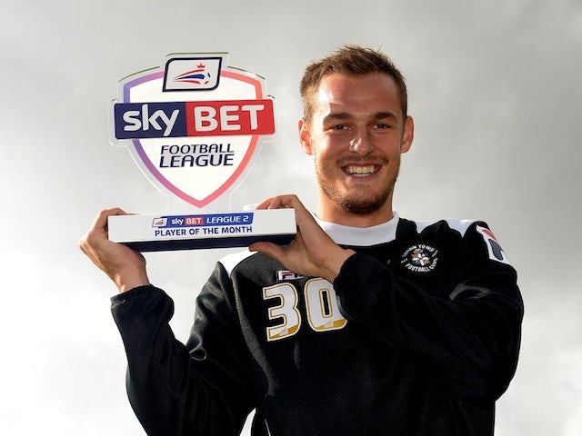 Luton's Luke Wilkinson with his Player of the Month award on October 9, 2014