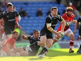 Falcons player Mark Wilson makes a break to set up the third try during the Aviva Premiership match between London Welsh and Newcastle Falcons at Kassam Stadium on October 11, 2014