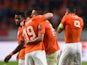 Holland's forward Ibrahim Afellay celebrates with teammates after scoring a goal during the Euro 2016 qualifying match between the Netherlands and Kazakhstan in Amsterdam, on October 10, 2014