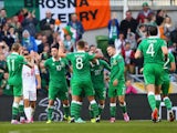 Captain Robbie Keane of Republic of Ireland celebrates with team mates after scoring a goal during the EURO 2016 Qualifier match against Gibraltar on October 11, 2014