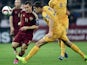 Russia's forward Aleksandr Kerzhakov fights for the ball with Moldova's midfielder Artur Ionita during the UEFA Euro 2016 qualifying football match between Russia and Moldova in Moscow on October 12, 2014