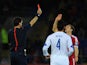 Wales player Andy King receives a straight red card from referee Manuel Grafe for a foul on Constantinos Makridis of Cyprus during the EURO 2016 Qualifier match on October 13, 2014