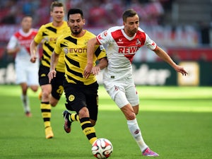 Vogt hands Koln lead over Dortmund