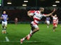 Charlie Sharples of Gloucester celebrates scoring his second try during the European Rugby Challenge Cup Pool 5 match against Brive on October 16, 2014