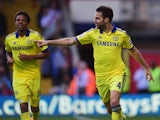 Cesc Fabregas of Chelsea celebrates with Loic Remy as he scores their second goal during the Barclays Premier League match between Crystal Palace and Chelsea at Selhurst Park on October 18, 2014