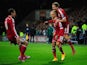 Wales player David Cotterill (c) celebrates his opening goal with Gareth Bale (l) and Andy King during the EURO 2016 Qualifier match against Cyprus on October 13, 2014