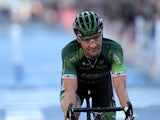 France's cyclist Thomas Voeckler of team Europcar crosses the finish line of the 108th edition of the Paris-Tours one-day cycling race over 237.5km, on October 12, 2014