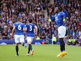 Romelu Lukaku of Everton rallies the fans as he celebrates scoring their second goal during the Barclays Premier League match between Everton and Aston Villa at Goodison Park on October 18, 2014