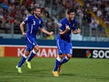 Graziano Pelle of Italy celebrates after scoring the first goal during the EURO 2016 Group H Qualifier match against Malta on October 13, 2014