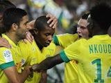 Nantes' French forward Johan Audel (C) celebrates with his teammates after scoring a goal during the French L1 football match between Nantes (FCN) and Reims (SR) on October 18, 2014