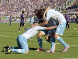 Lazio players celebrate a goal scored by Senad Lulic during the Serie A match between ACF Fiorentina and SS Lazio at Stadio Artemio Franchi on October 19, 2014