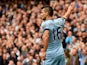 Sergio Aguero of Manchester City celebrates after scoring the opening goal during the Barclays Premier League match between Manchester City and Tottenham Hotspur at Etihad Stadium on October 18, 2014