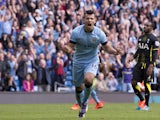 Manchester City's Argentinian striker Sergio Aguero celebrates scoring his, and their third goal from the penalty spot during the English Premier League football match between Manchester City and Tottenham Hotspur at the The Etihad Stadium in Manchester, 