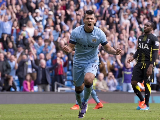 Manchester City's Argentinian striker Sergio Aguero celebrates scoring his, and their third goal from the penalty spot during the English Premier League football match between Manchester City and Tottenham Hotspur at the The Etihad Stadium in Manchester, 