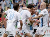Melbourne players celebrate David Villa kicking a goal in the final minutes during the round two A-League match between Melbourne City and the Newcastle Jets at AAMI Park on October 19, 2014