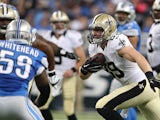 Josh Hill #89 of the New Orleans Saints looks to gain yards against the Detroit Lions in the second quarter at Ford Field on October 19, 2014