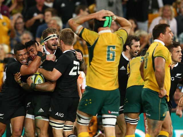 Malakai Fekitoa of the All Blacks celebrates scoring the winning try during The Rugby Championship match between the Australian Wallabies and the New Zealand All Blacks at Suncorp Stadium on October 18, 2014
