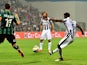 Juventus French midfielder Paul Pogba kicks and scores during the Serie A football match between Sassuolo and Juventus at the Mapei Stadium in Reggio Emilia on October 18 , 2014