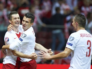 Poland maintain Group D advantage