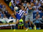 Sam Hutchinson of Sheffield Wednesday in action with Mehdi Abeid (R) of Newcastle during the Pre Season Friendly between Sheffield Wednesday and Newcastle United at Hillsborough on July 30, 2014