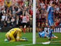 Despair for goalkeeper Vito Mannone and the Sunderland defence as Sadio Mane of Southampton scores the eight goal during the Barclays Premier League match between Southampton and Sunderland at St Mary's Stadium on October 18, 2014