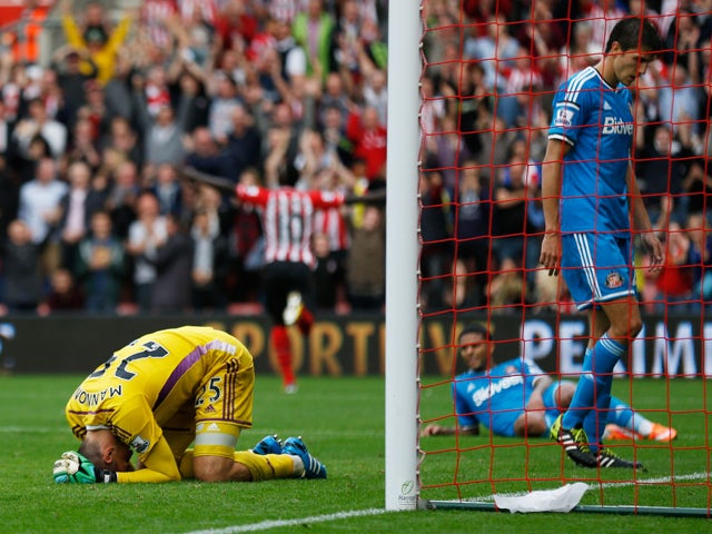Despair for goalkeeper Vito Mannone and the Sunderland defence as Sadio Mane of Southampton scores the eight goal during the Barclays Premier League match between Southampton and Sunderland at St Mary's Stadium on October 18, 2014